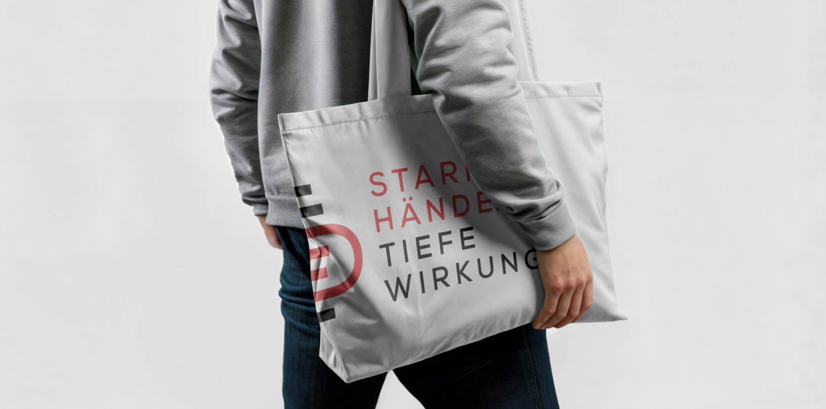 Logo und Markenclaim auf Tasche